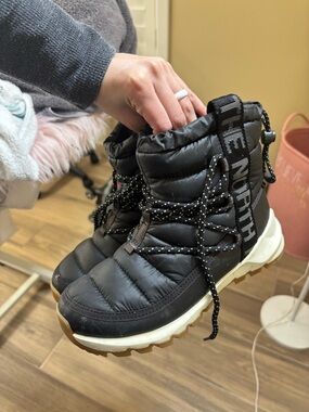 The North Face Black Quilted Winter Lace-Up Boots with Tan Sole